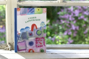 Under lapptäcket